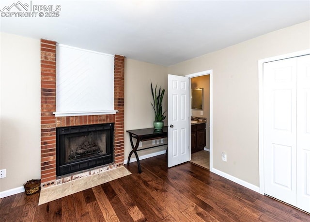 3730 Deep Haven Dr, Colorado Springs, CO 80920 - unfurnished living room with wood finished floors and a fireplace