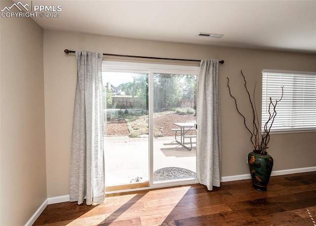 3730 Deep Haven Dr, Colorado Springs, CO 80920 - entryway with wood finished floors and baseboards