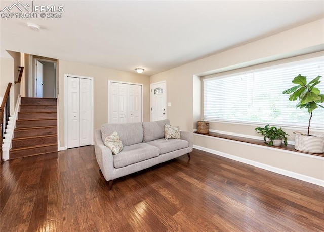 3730 Deep Haven Dr, Colorado Springs, CO 80920 - living area featuring dark wood-type flooring and stairway