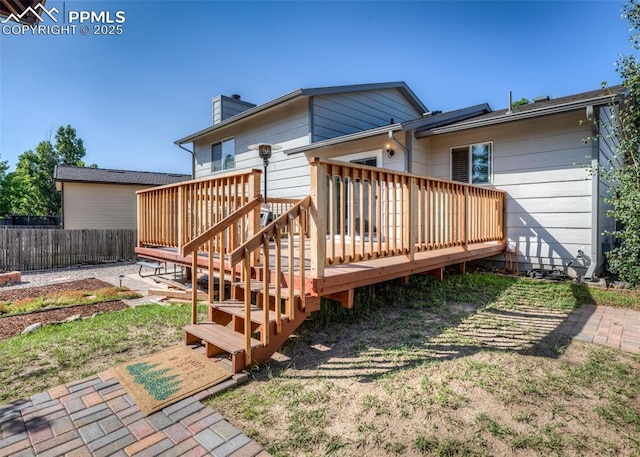3730 Deep Haven Dr, Colorado Springs, CO 80920 - back of property featuring a chimney and a wooden deck