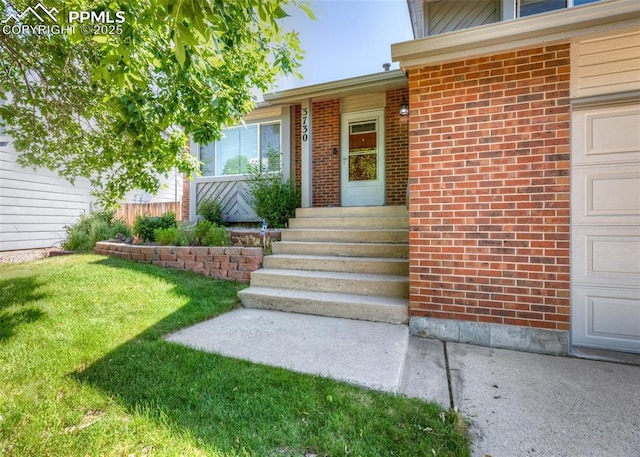 3730 Deep Haven Dr, Colorado Springs, CO 80920 - entrance to property featuring brick siding and a garage
