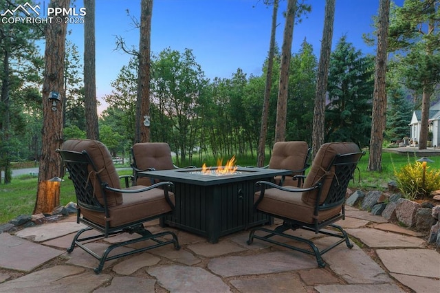 18971 Shadowood Dr, Monument, CO 80132 - view of patio / terrace with a fire pit
