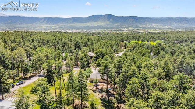 18971 Shadowood Dr, Monument, CO 80132 - bird's eye view of a heavily wooded area and mountains
