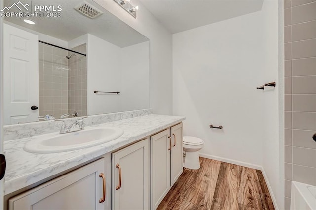 6237 Bodacious Cir, Colorado Springs, CO 80923 - full bath with vanity and wood finished floors