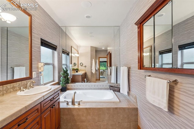 20401 High Pines Dr, Monument, CO 80132 - full bath with a garden tub, healthy amount of natural light, and vanity