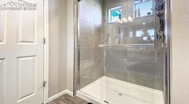 6640 Backcountry Loop, Colorado Springs, CO 80927 - bathroom with a shower stall and wood finished floors