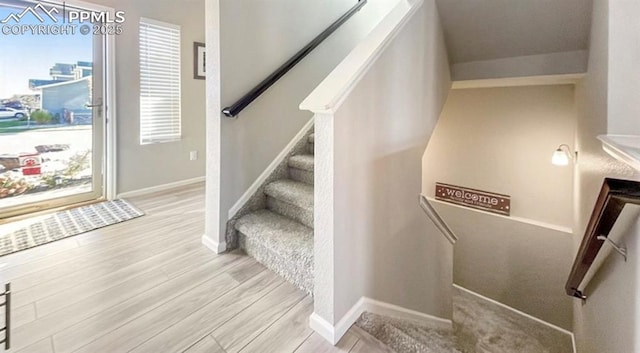 6640 Backcountry Loop, Colorado Springs, CO 80927 - staircase with wood finished floors and baseboards