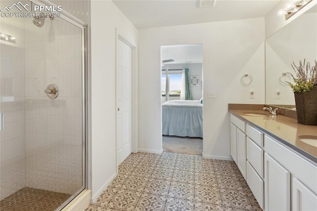 6469 Bodacious Cir, Colorado Springs, CO 80923 - ensuite bathroom featuring a stall shower and double vanity
