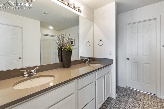 6469 Bodacious Cir, Colorado Springs, CO 80923 - full bath featuring double vanity, tile patterned flooring, and a stall shower