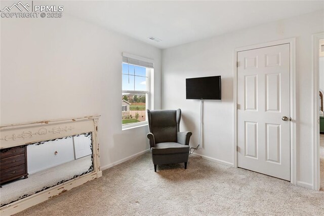 6469 Bodacious Cir, Colorado Springs, CO 80923 - living area featuring carpet and baseboards