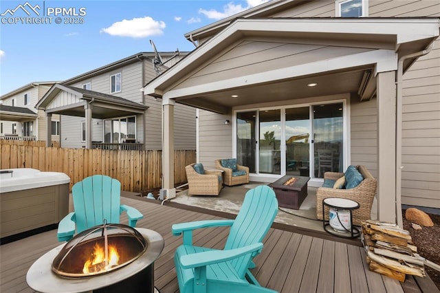 6469 Bodacious Cir, Colorado Springs, CO 80923 - deck featuring a fire pit and a hot tub