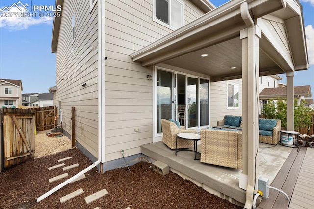 6469 Bodacious Cir, Colorado Springs, CO 80923 - wooden deck featuring an outdoor hangout area