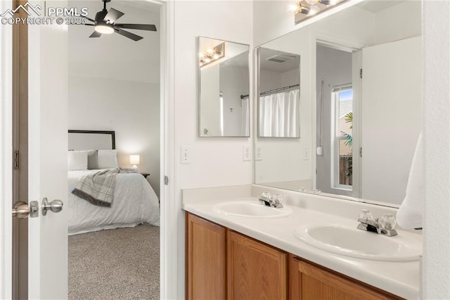7632 Fiona Ln, Fountain, CO 80817 - full bathroom with ensuite bath, double vanity, and ceiling fan