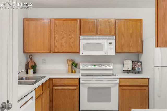 7632 Fiona Ln, Fountain, CO 80817 - kitchen with white appliances and light countertops