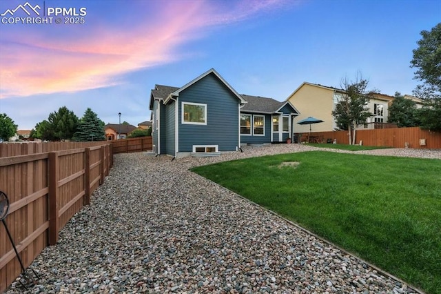 5584 Calamity Jane Ln, Colorado Springs, CO 80923 - back of house featuring a fenced backyard