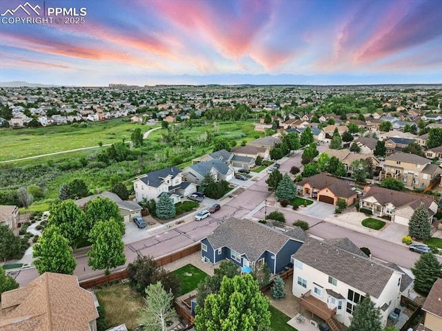 5584 Calamity Jane Ln, Colorado Springs, CO 80923 - aerial view at dusk of a residential view