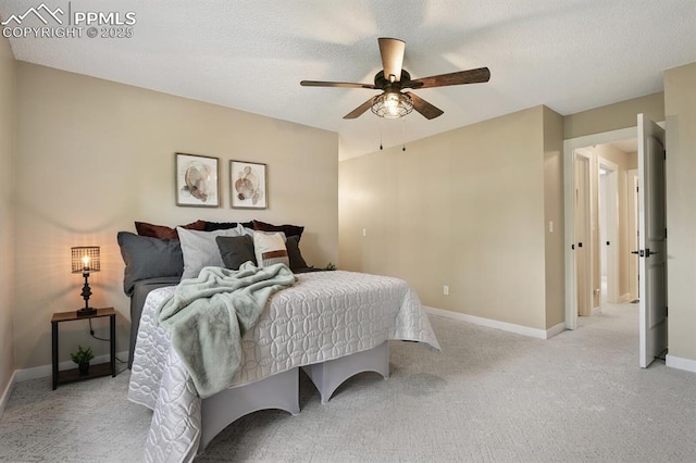79 W Old Broadmoor Rd, Colorado Springs, CO 80906 - bedroom with a ceiling fan and light carpet