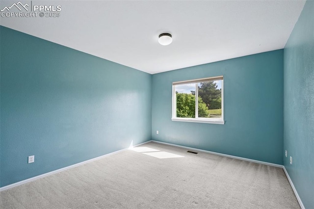 1562 Lookout Springs Dr, Colorado Springs, CO 80921 - carpeted empty room featuring baseboards