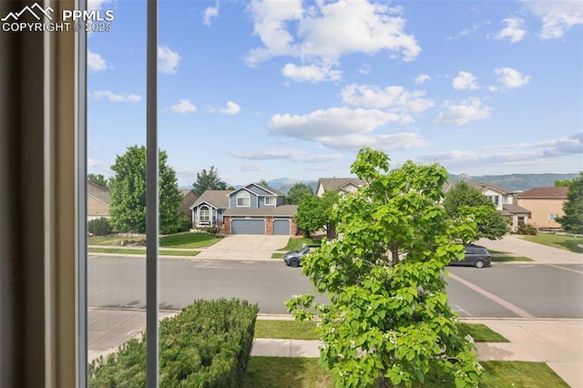 1562 Lookout Springs Dr, Colorado Springs, CO 80921 - view of asphalt street featuring sidewalks, a residential view, and curbs