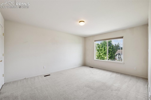 1562 Lookout Springs Dr, Colorado Springs, CO 80921 - spare room featuring carpet flooring and baseboards