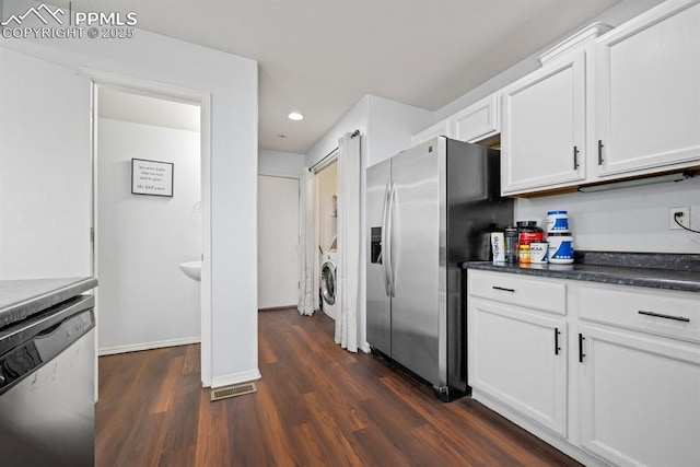 245 Turf Trail Pl, Fountain, CO 80817 - kitchen with stainless steel appliances, recessed lighting, dark wood-style floors, white cabinetry, and dark countertops