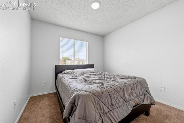 245 Turf Trail Pl, Fountain, CO 80817 - bedroom featuring carpet flooring and a textured ceiling