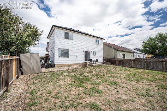 245 Turf Trail Pl, Fountain, CO 80817 - back of house with a fenced backyard and a patio area