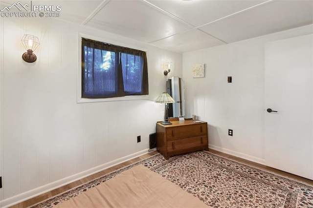 53 Iris Rd, Woodland Park, CO 80863 - bedroom featuring wood finished floors and baseboards