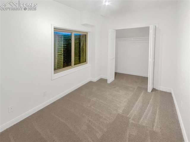 570 Ore Cart Way, Monument, CO 80132 - unfurnished bedroom with carpet floors and a closet
