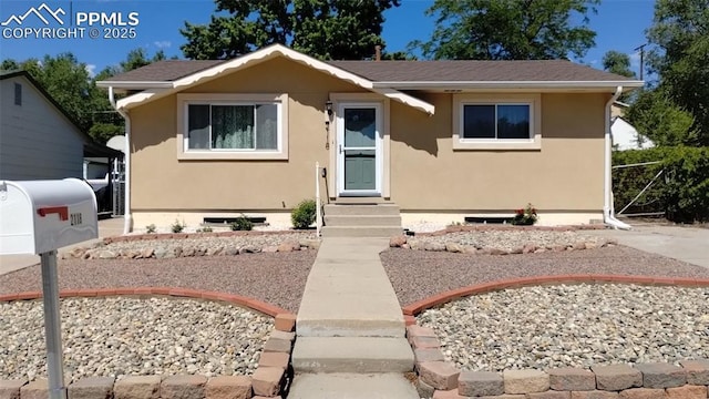 2118 N Chestnut St, Colorado Springs, CO 80907 - bungalow-style home featuring stucco siding