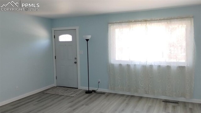 2118 N Chestnut St, Colorado Springs, CO 80907 - entrance foyer featuring wood finished floors