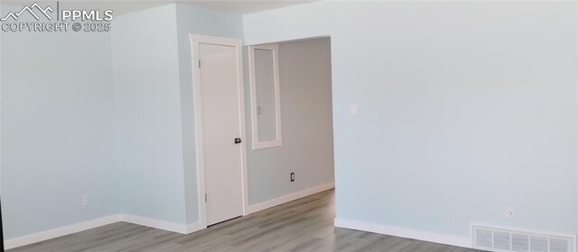 2118 N Chestnut St, Colorado Springs, CO 80907 - empty room featuring light wood-style flooring