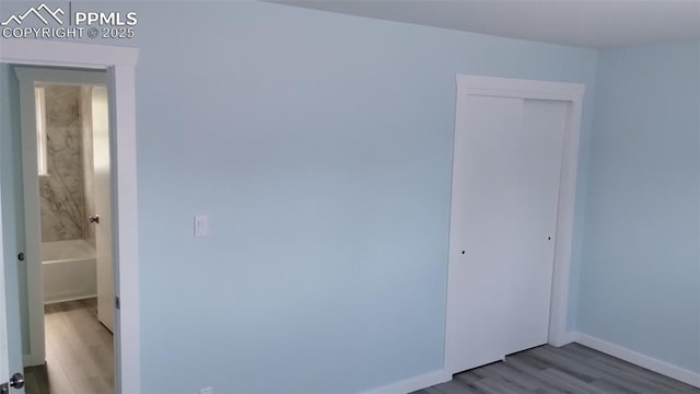 2118 N Chestnut St, Colorado Springs, CO 80907 - spare room with wood finished floors and baseboards