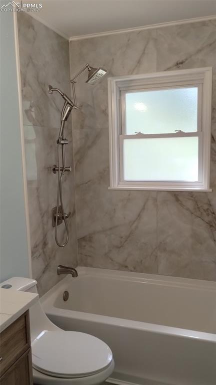 2118 N Chestnut St, Colorado Springs, CO 80907 - full bath featuring vanity and  shower combination