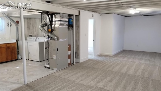 2118 N Chestnut St, Colorado Springs, CO 80907 - finished basement with washing machine and dryer, light carpet, and heating unit