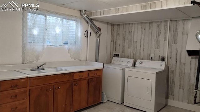 2118 N Chestnut St, Colorado Springs, CO 80907 - washroom featuring washing machine and dryer and cabinet space
