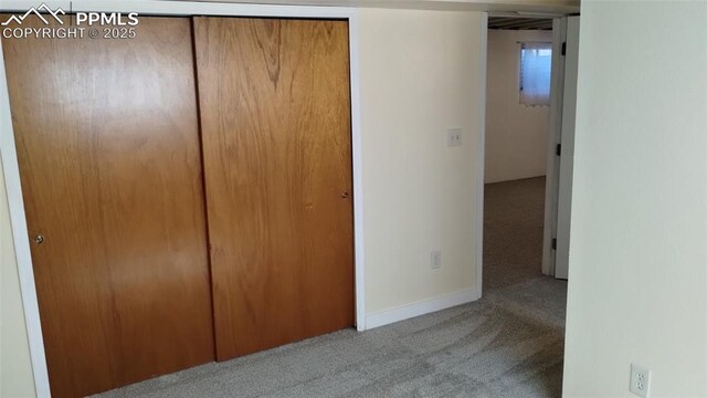 2118 N Chestnut St, Colorado Springs, CO 80907 - unfurnished bedroom featuring carpet flooring and a closet