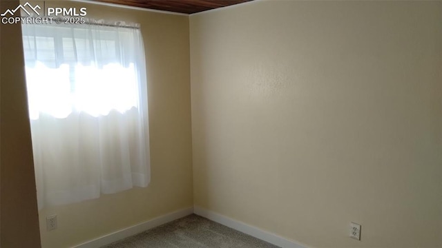 2118 N Chestnut St, Colorado Springs, CO 80907 - unfurnished room featuring baseboards and carpet flooring