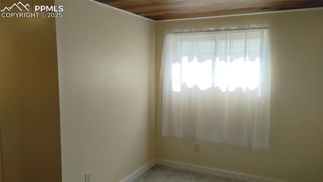 2118 N Chestnut St, Colorado Springs, CO 80907 - unfurnished room with baseboards and wood ceiling