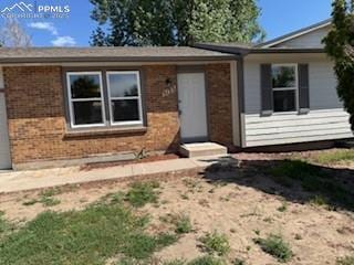 5135 Webbed Foot Way, Colorado Springs, CO 80911 - ranch-style house featuring brick siding