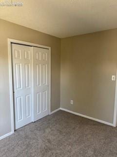 5135 Webbed Foot Way, Colorado Springs, CO 80911 - unfurnished bedroom featuring carpet and a closet