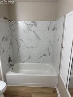 5135 Webbed Foot Way, Colorado Springs, CO 80911 - bathroom with wood finished floors and shower / bath combination