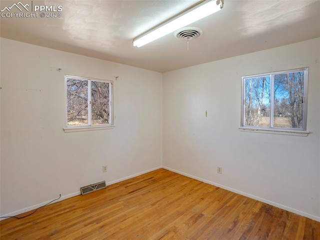 1161 Supple Cir, Pueblo, CO 81006 - empty room with baseboards and light wood finished floors