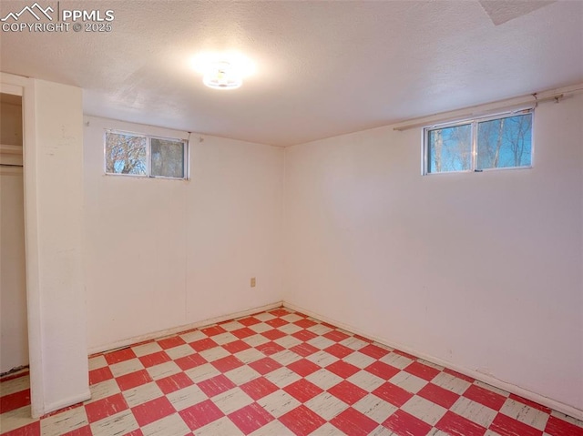 1161 Supple Cir, Pueblo, CO 81006 - basement with light floors and a textured ceiling