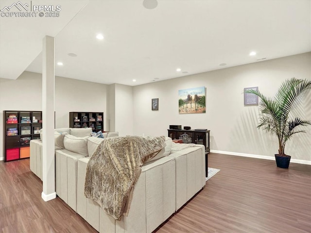 12646 Windingwalk Dr, Peyton, CO 80831 - living area with wood finished floors and recessed lighting