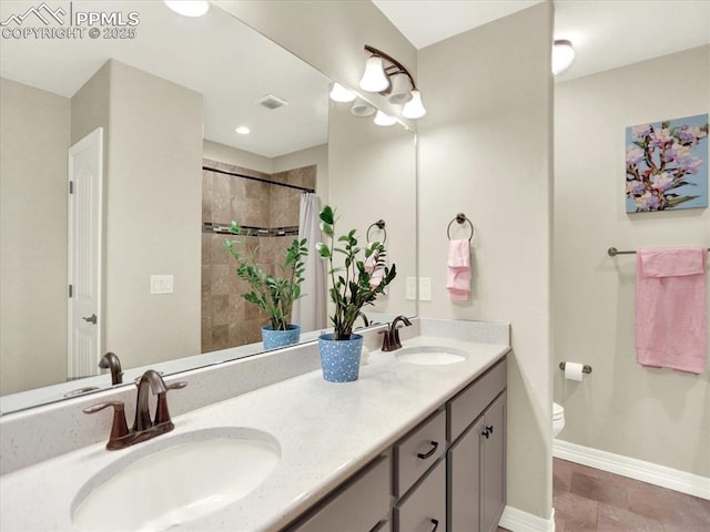 12646 Windingwalk Dr, Peyton, CO 80831 - bathroom with double vanity and a tile shower