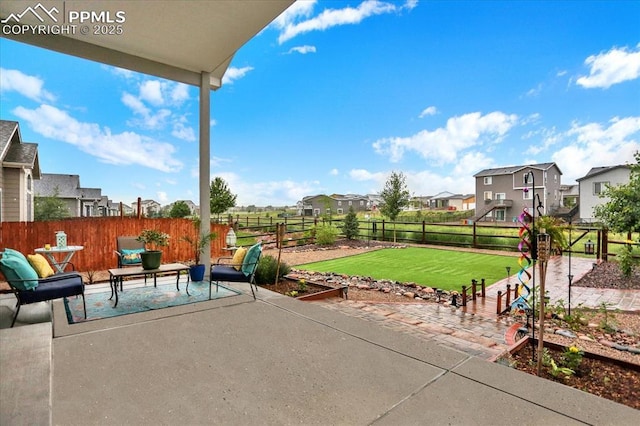 12646 Windingwalk Dr, Peyton, CO 80831 - fenced backyard featuring a patio and a residential view