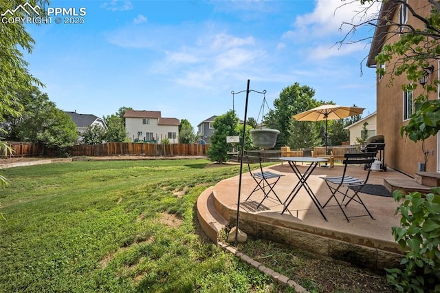 1880 Windover Ct, Fountain, CO 80817 - fenced backyard with a patio area and a residential view