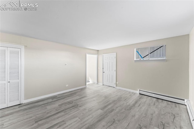 232 S Hancock Ave, Colorado Springs, CO 80903 - empty room featuring baseboard heating and wood finished floors