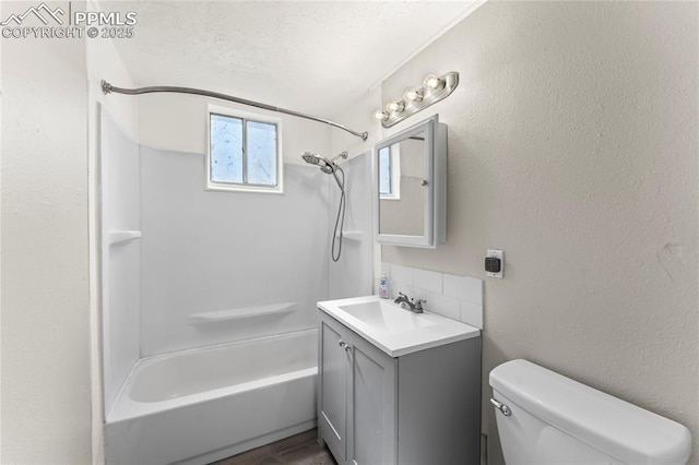 232 S Hancock Ave, Colorado Springs, CO 80903 - full bathroom featuring vanity,  shower combination, and a textured wall